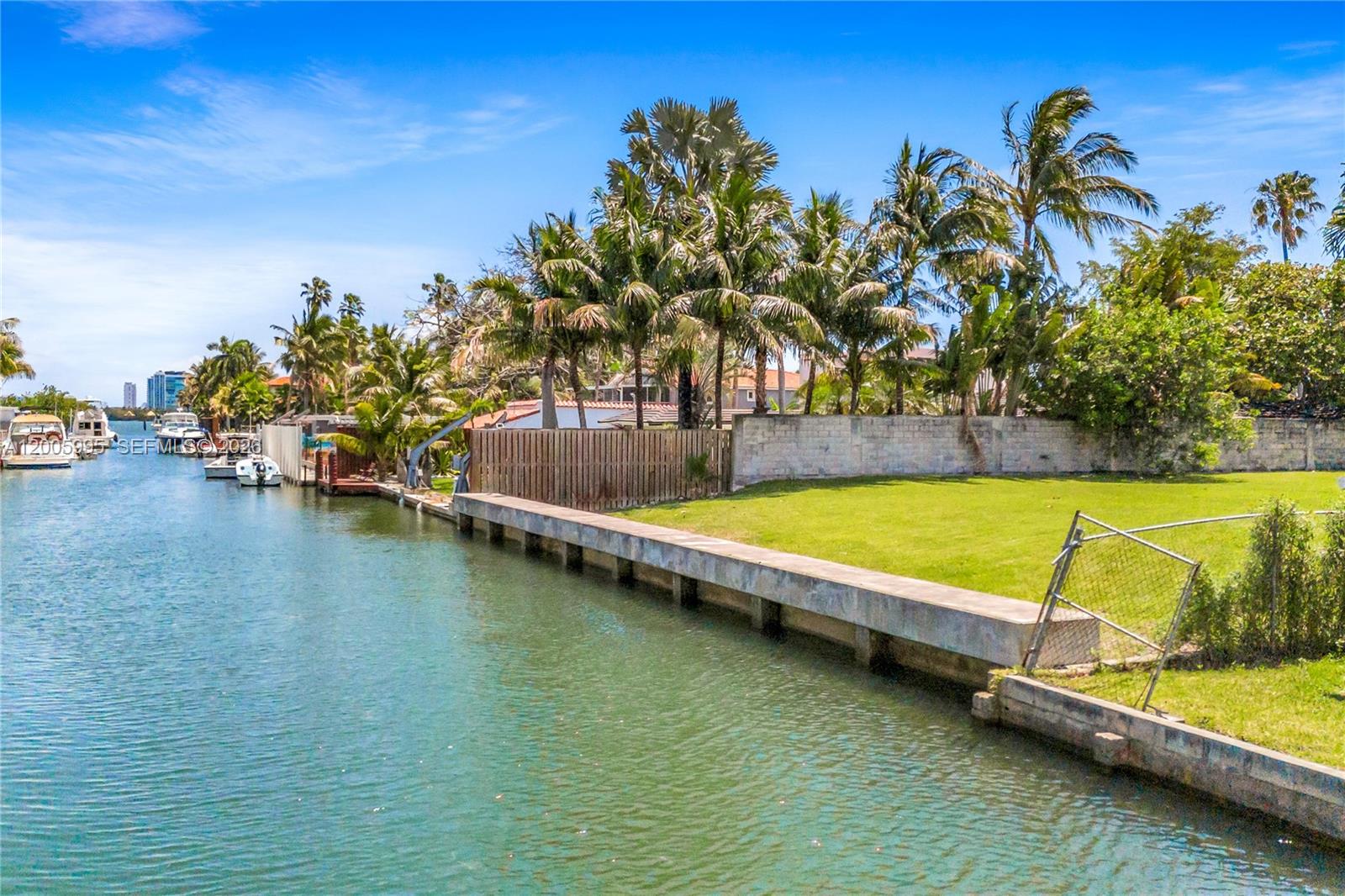 1051 Northeast 83rd Street Miami, FL 33138 - Photo 1 of 11 a view of a swimming pool and lounge chairs