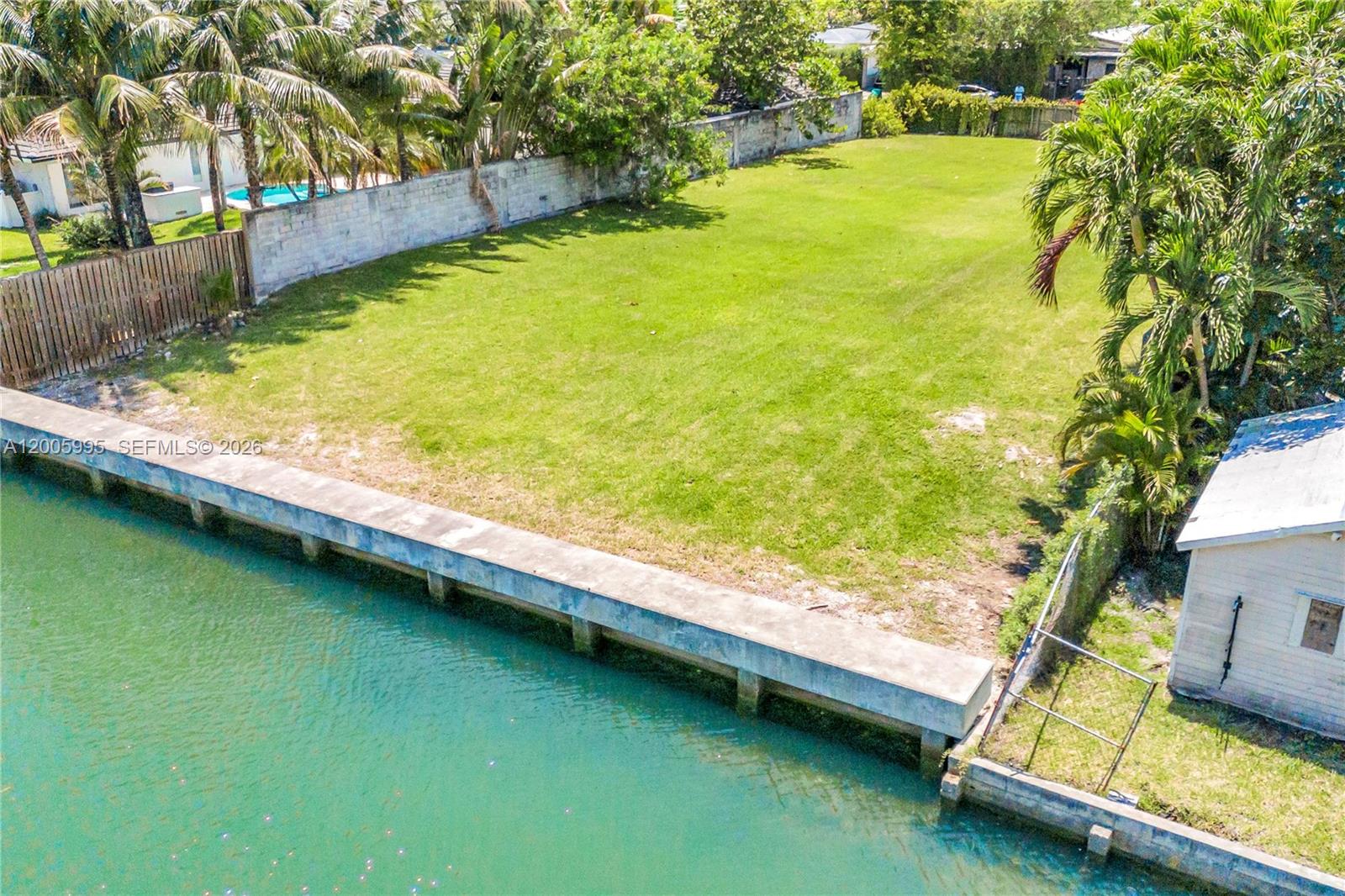 1051 Northeast 83rd Street Miami, FL 33138 - Photo 2 of 11 a view of swimming pool with a yard
