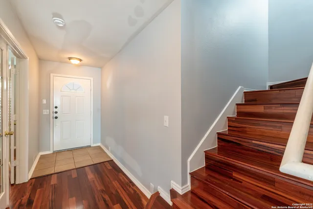 a view of entryway with wooden floor