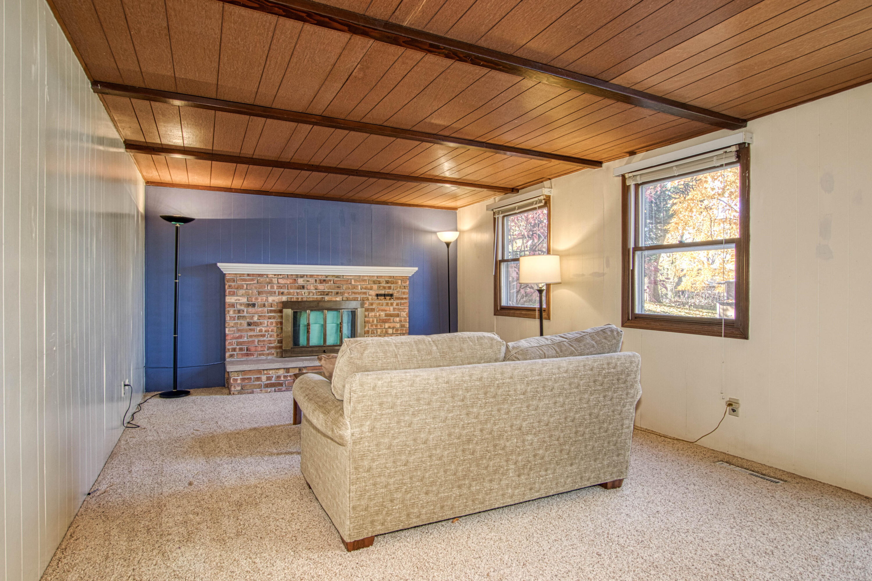 216 Country Club Road Holland, MI 49423 - Photo 28 of 43 Recreation Room with Fireplace