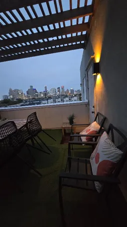 a view of a balcony with an ocean view