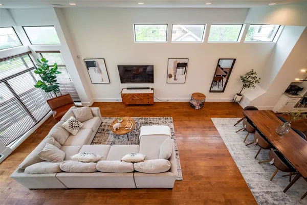a living room with furniture and a rug