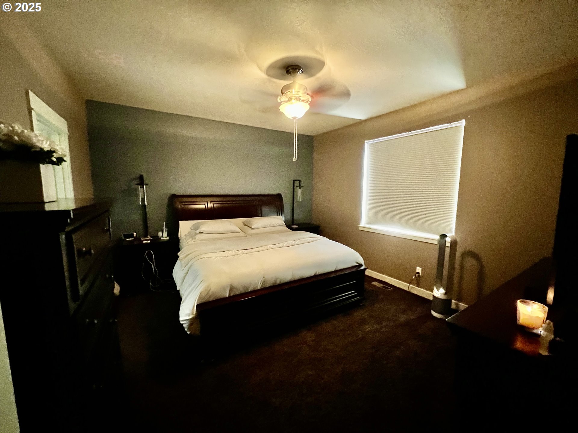 61257 Bronze Meadow Lane Bend, OR 97702 - Photo 9 of 16 a bed sitting in a room next to a window