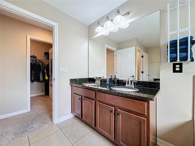 a bathroom with a tub and a shower