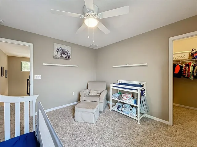 a bathroom with a sink a vanity and a mirror