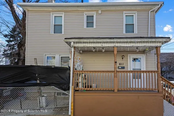 a front view of a house with balcony