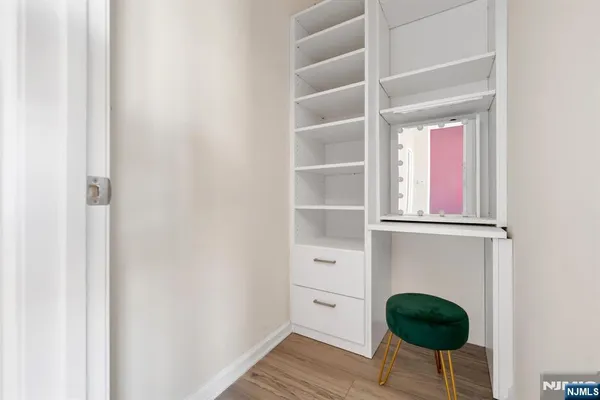 a view of livingroom with furniture and wooden floor