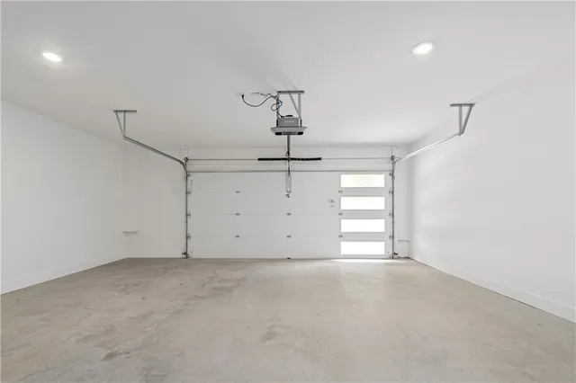 a view of empty room with wooden walls