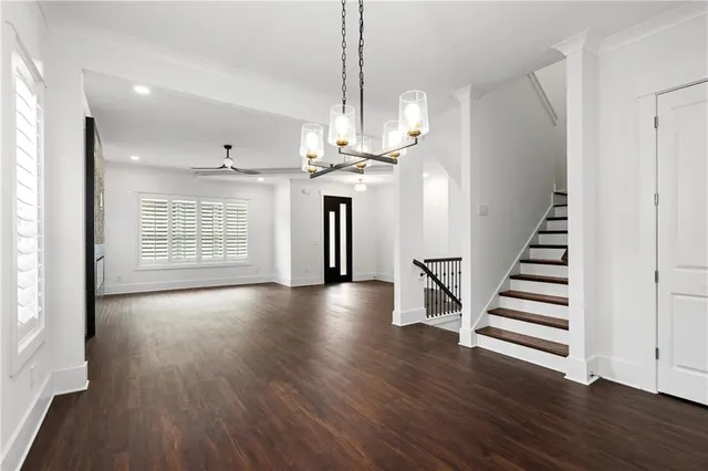 a view of entryway with wooden floor