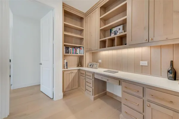a kitchen with stainless steel appliances granite countertop a sink and cabinets