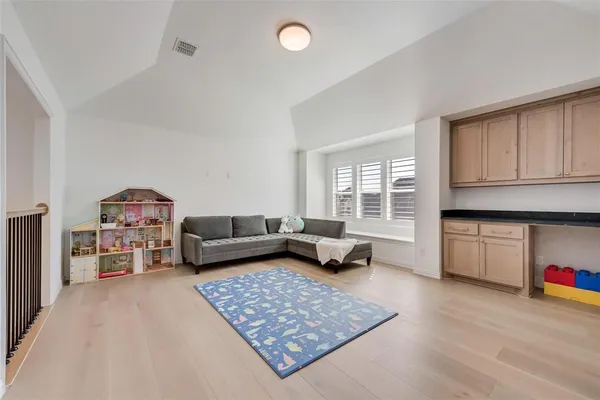 a living room with furniture and a couch