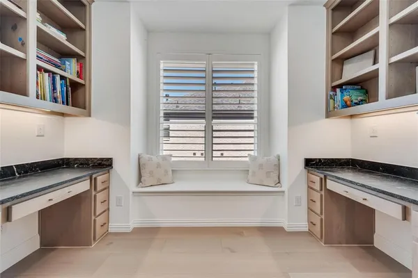 a kitchen with a stove and a cabinet