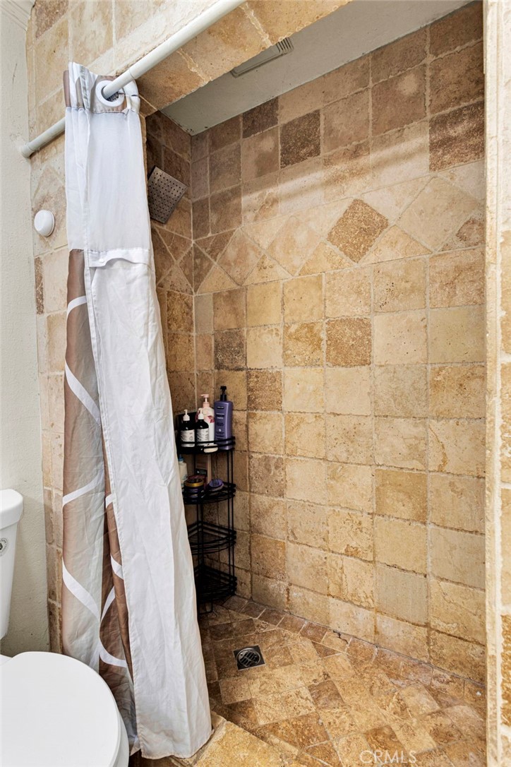 1087 Baseline Road La Verne, CA 91750 - Photo 20 of 39 a bathroom with a shower and a toilet