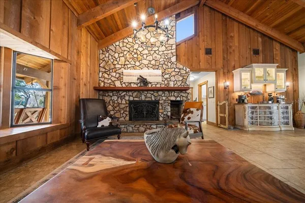 a front view of a house with a large window