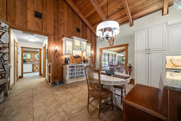 a bathroom with a toilet and shower