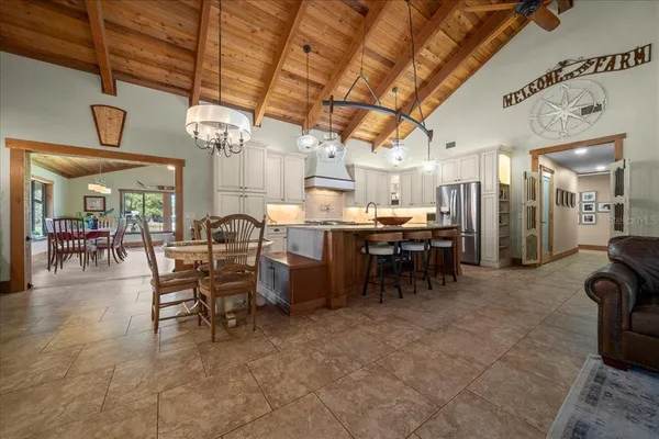 a view of a hallway with wooden walls