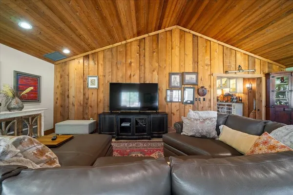 a view of two chairs in a balcony