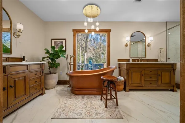 a aerial view of a house with a yard