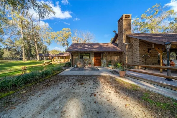 a view of a chairs and tables in the patio