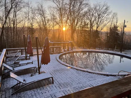 a car parked in front of a house with a yard