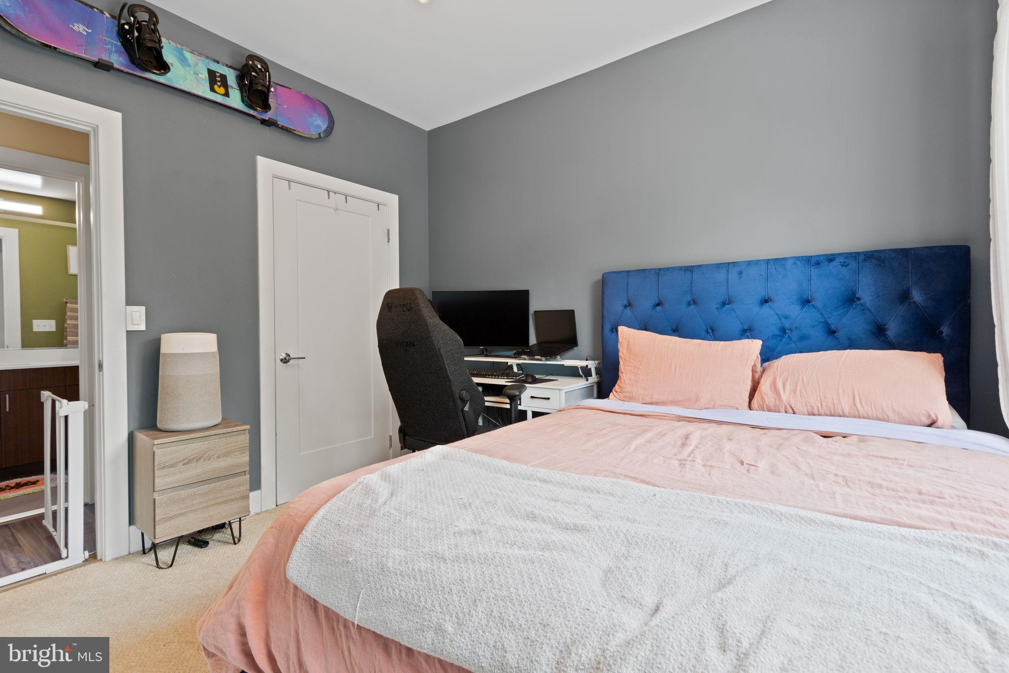 1111 Orren Street Northeast, Unit 207 Washington, DC 20002 - Photo 13 of 21 Chic bedroom with modern accents and style.