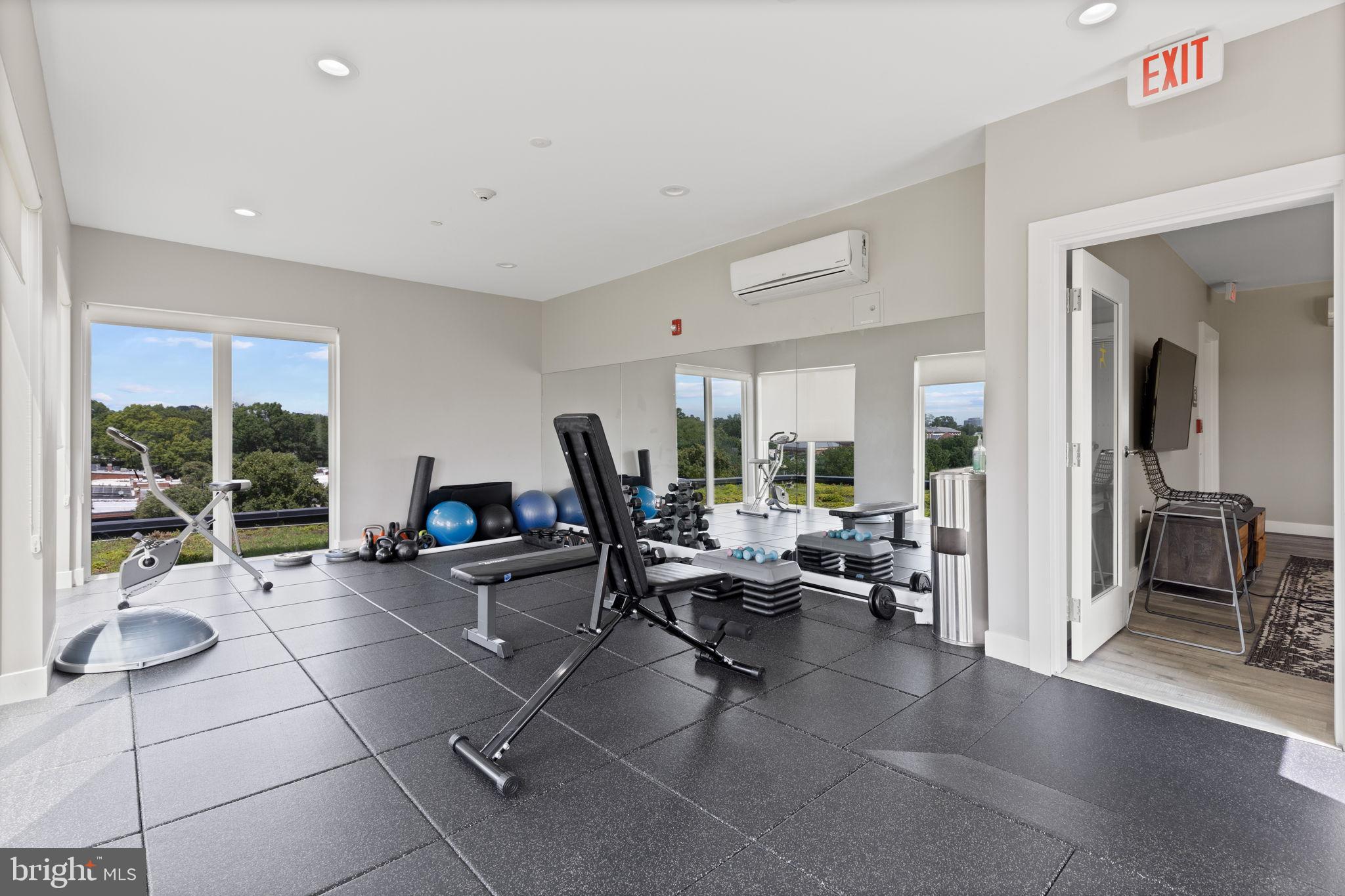 1111 Orren Street Northeast, Unit 207 Washington, DC 20002 - Photo 15 of 21 Bright fitness space with scenic views.
