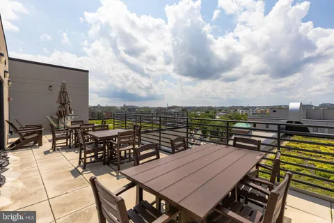 a view of a terrace with seating area