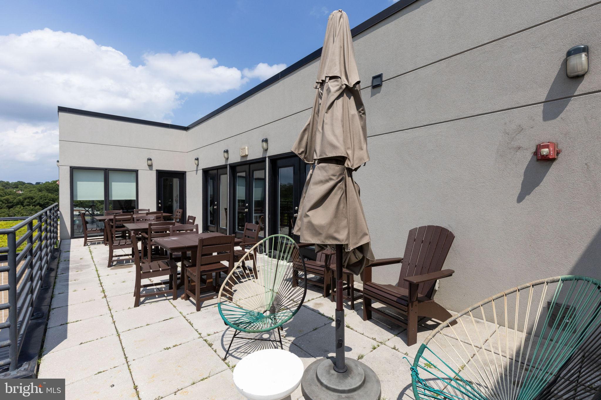 1111 Orren Street Northeast, Unit 207 Washington, DC 20002 - Photo 17 of 21 Stylish rooftop terrace with scenic views.