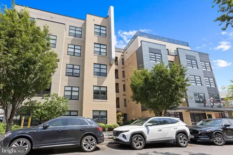 a car parked in front of a building