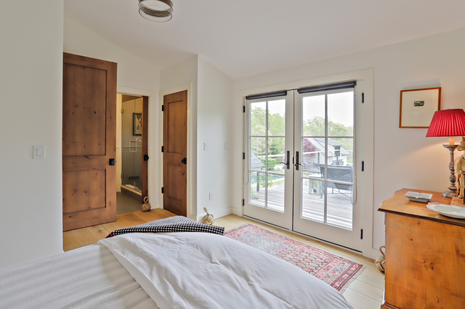 9 Ridge Hill Road Chilmark, MA 02535 - Photo 36 of 48 a bedroom with a bed and large window