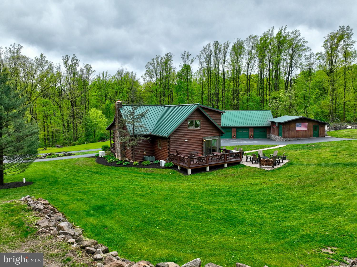 491 Sheep Hill Road Newmanstown, PA 17073 - Photo 30 of 30 a view of a house with backyard sitting area and garden