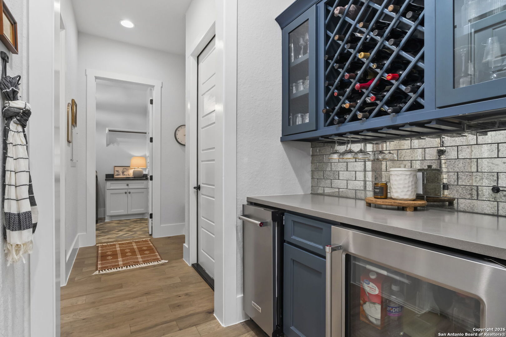 71 Sabinas Creek Ranch Road Boerne, TX 78006 - Photo 14 of 38 a kitchen with wooden cabinets and a sink