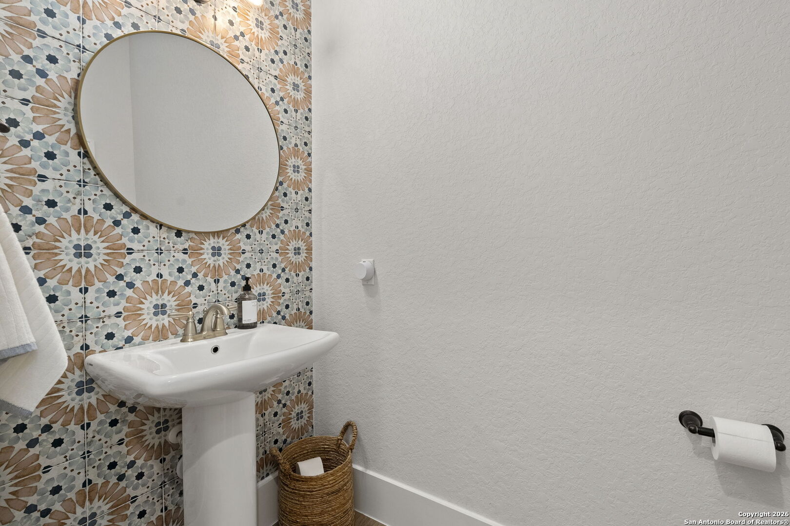 71 Sabinas Creek Ranch Road Boerne, TX 78006 - Photo 15 of 38 a bathroom with a sink mirror and toilet