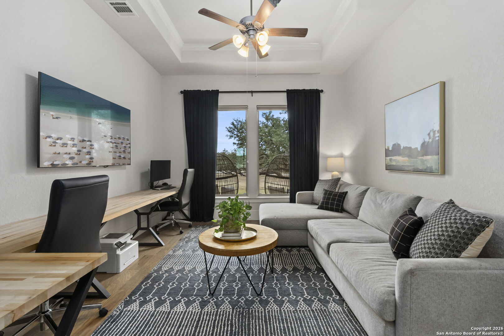 71 Sabinas Creek Ranch Road Boerne, TX 78006 - Photo 22 of 38 a living room with furniture a table and a large window