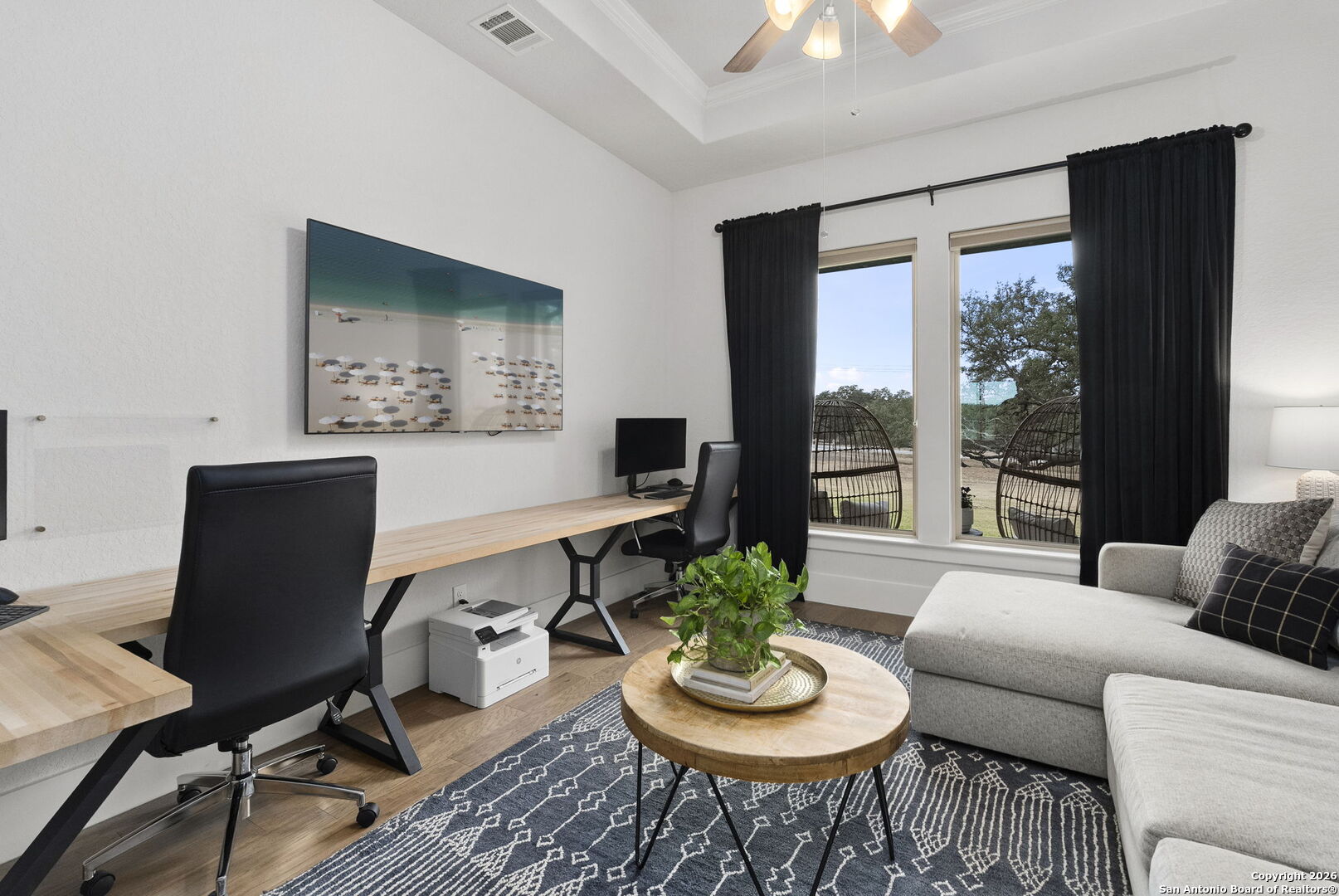 71 Sabinas Creek Ranch Road Boerne, TX 78006 - Photo 23 of 38 a living room with furniture and a potted plant
