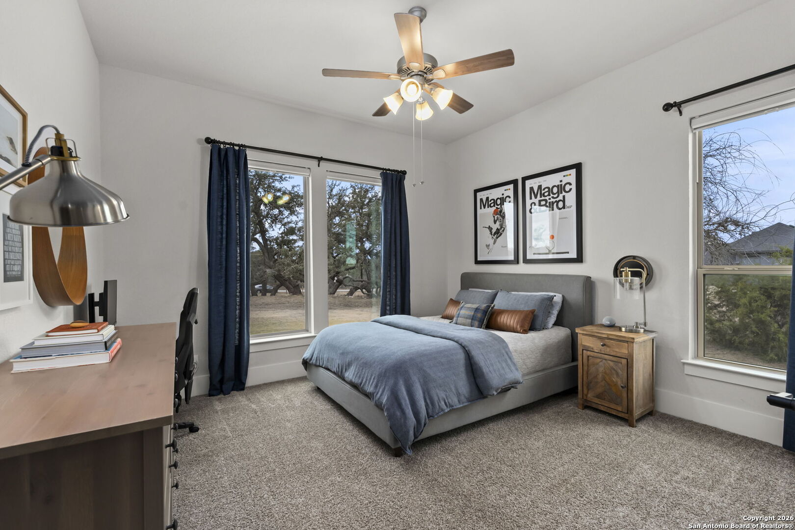 71 Sabinas Creek Ranch Road Boerne, TX 78006 - Photo 24 of 38 a living room with a bed furniture and a window