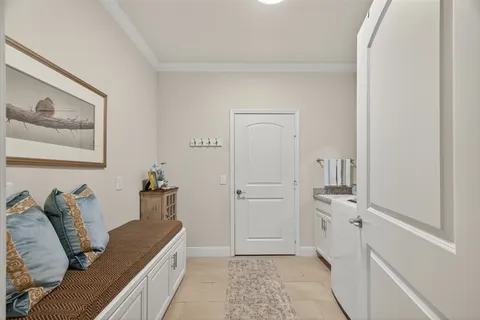 a room with furniture and wooden floor