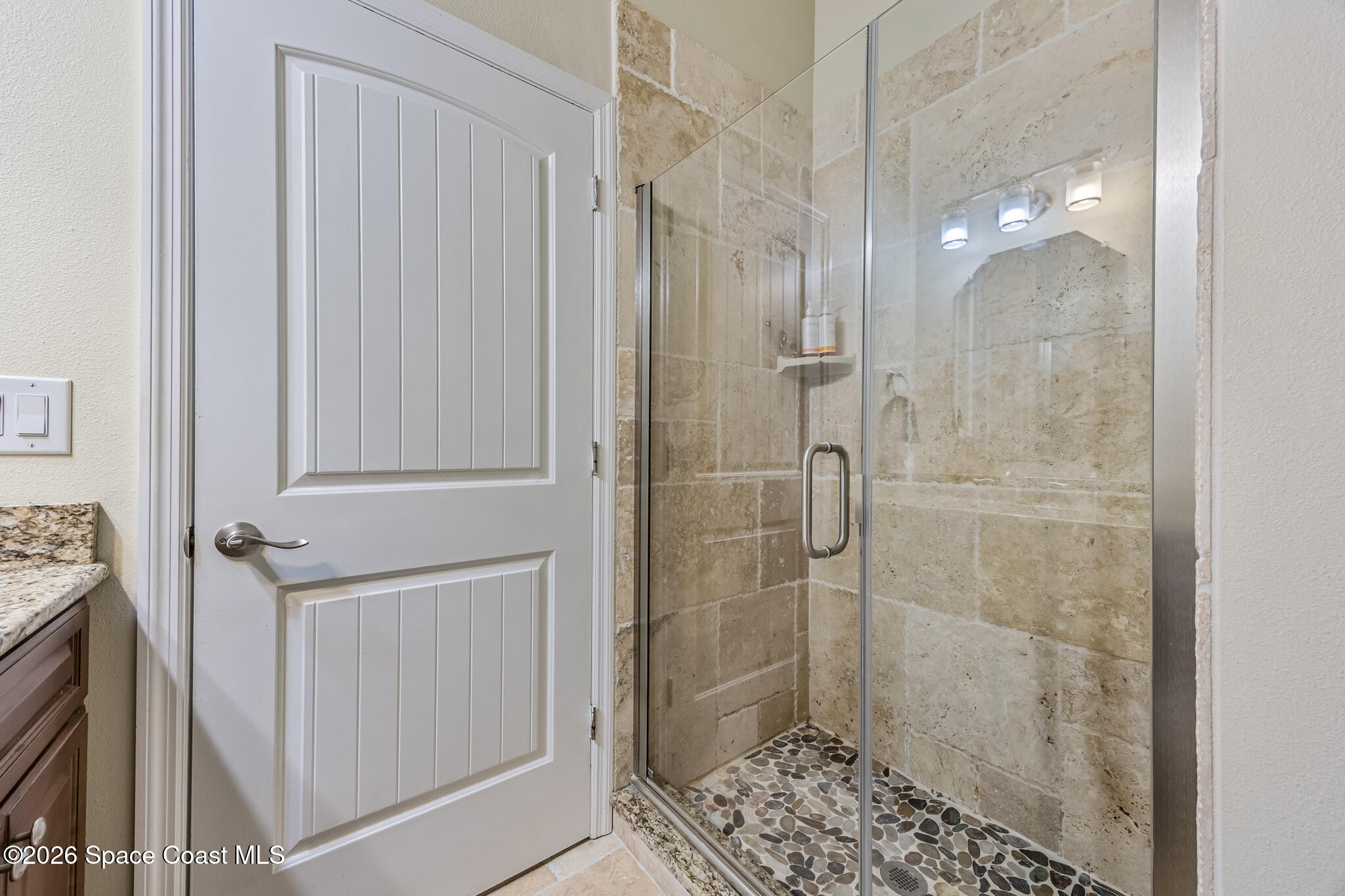 2709 Cutlass Point Lane, Unit 103 Merritt Island, FL 32953 - Photo 14 of 31 a bathroom with a shower