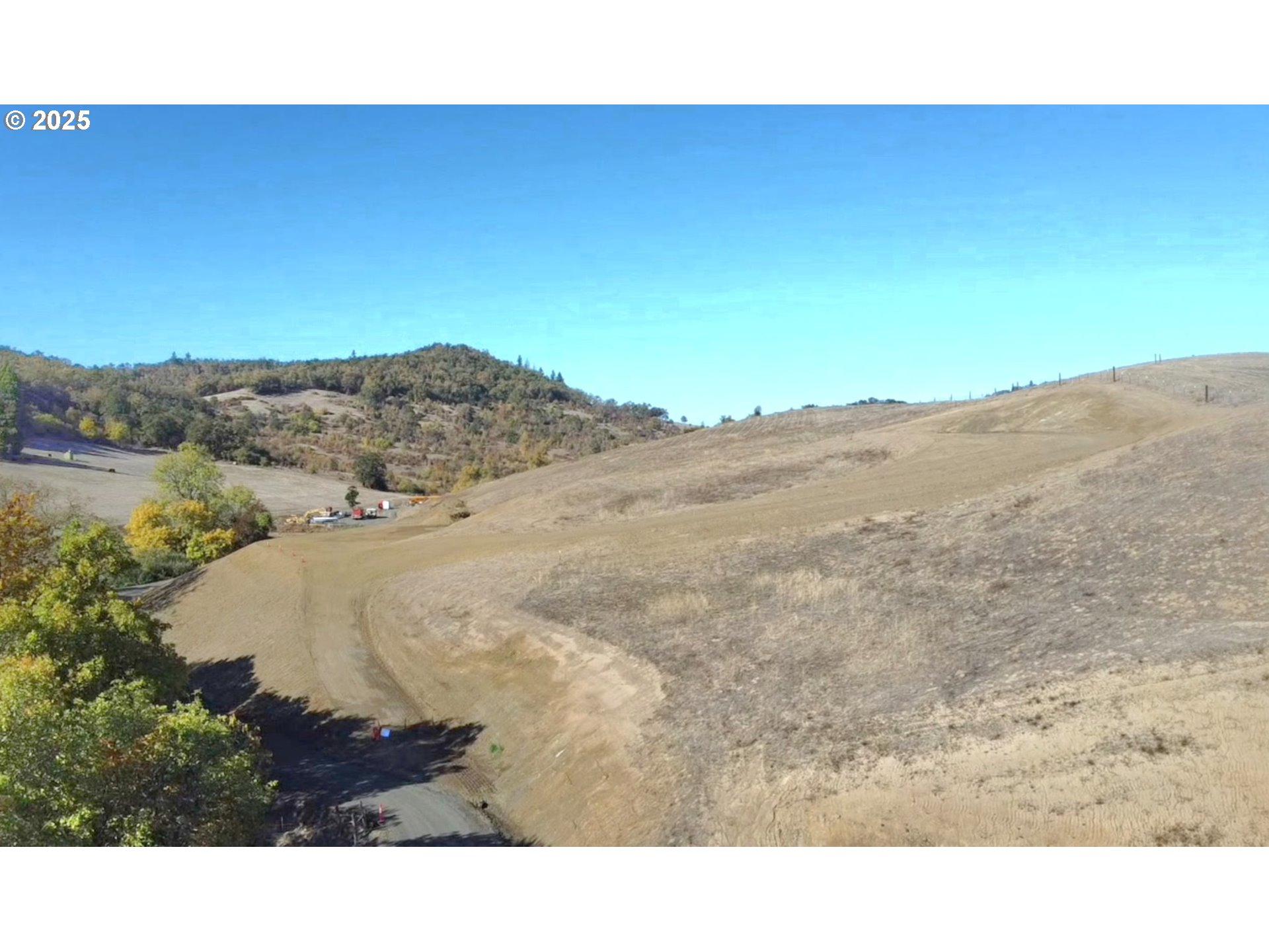 359 Ladybug Lane Roseburg, OR 97470 - Photo 6 of 13 a black and white photo of a field