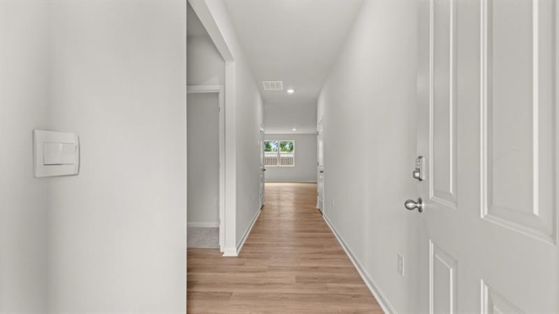 29 Coggins Place Northeast Rome, GA 30165 - Photo 2 of 41 a view of a hallway with wooden floor