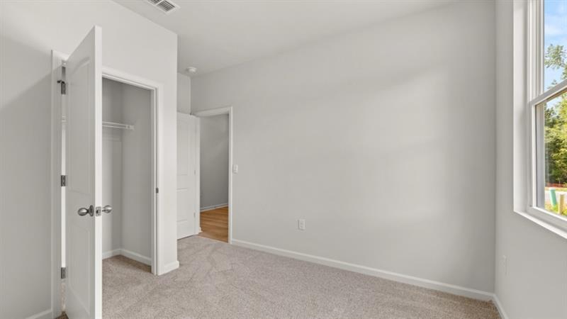 29 Coggins Place Northeast Rome, GA 30165 - Photo 23 of 41 a view of an empty room with a window