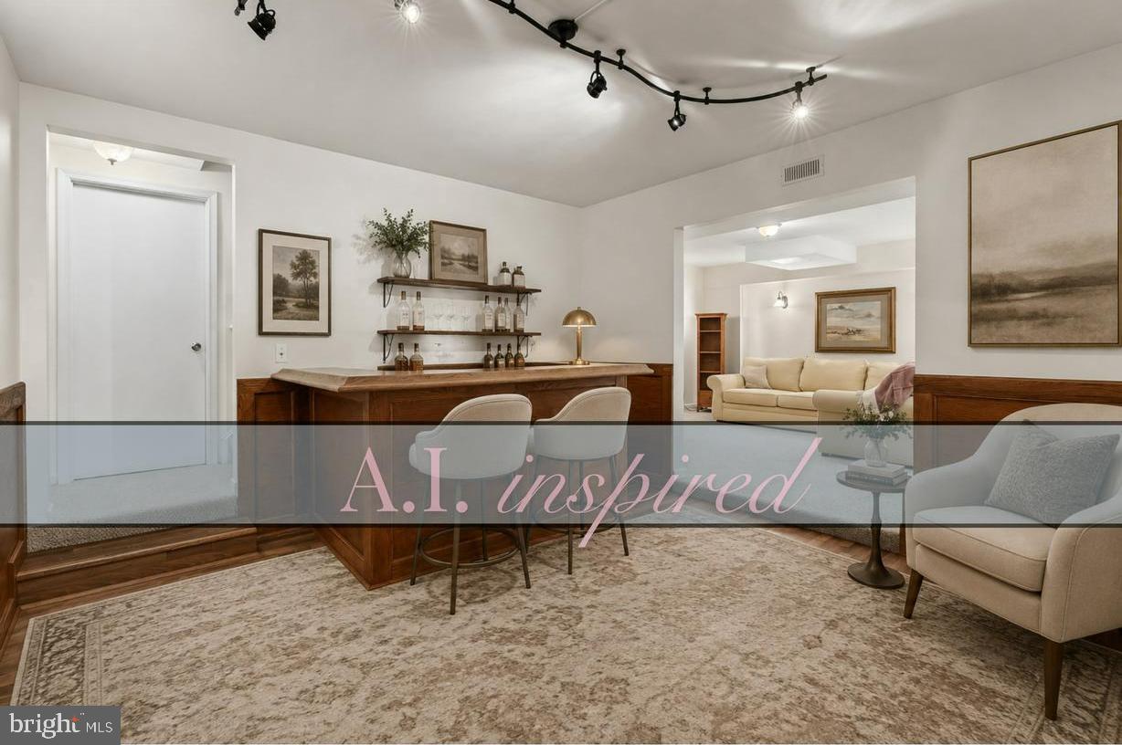 12345 H G Trueman Road Lusby, MD 20657 - Photo 19 of 38 a living room with furniture and kitchen view