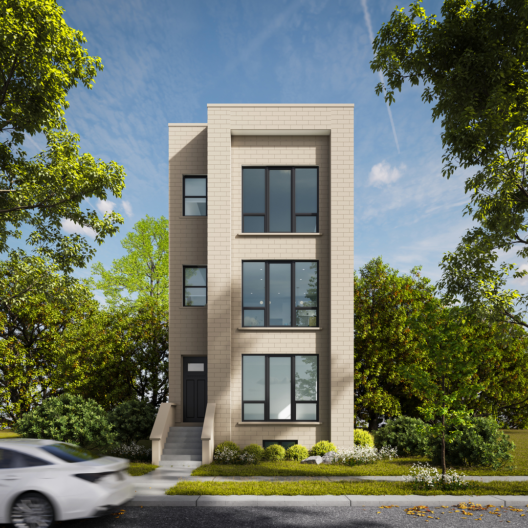 2636 West Evergreen Avenue, Unit 2 Chicago, IL 60622 - Photo 1 of 6 a view of a brick house with a yard