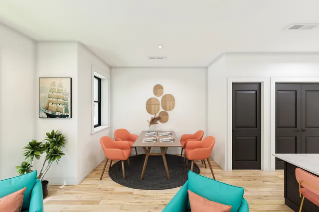 a living room with furniture potted plant and a chandelier