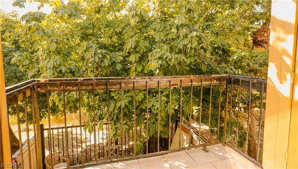 a view of swimming pool with sitting area and slide