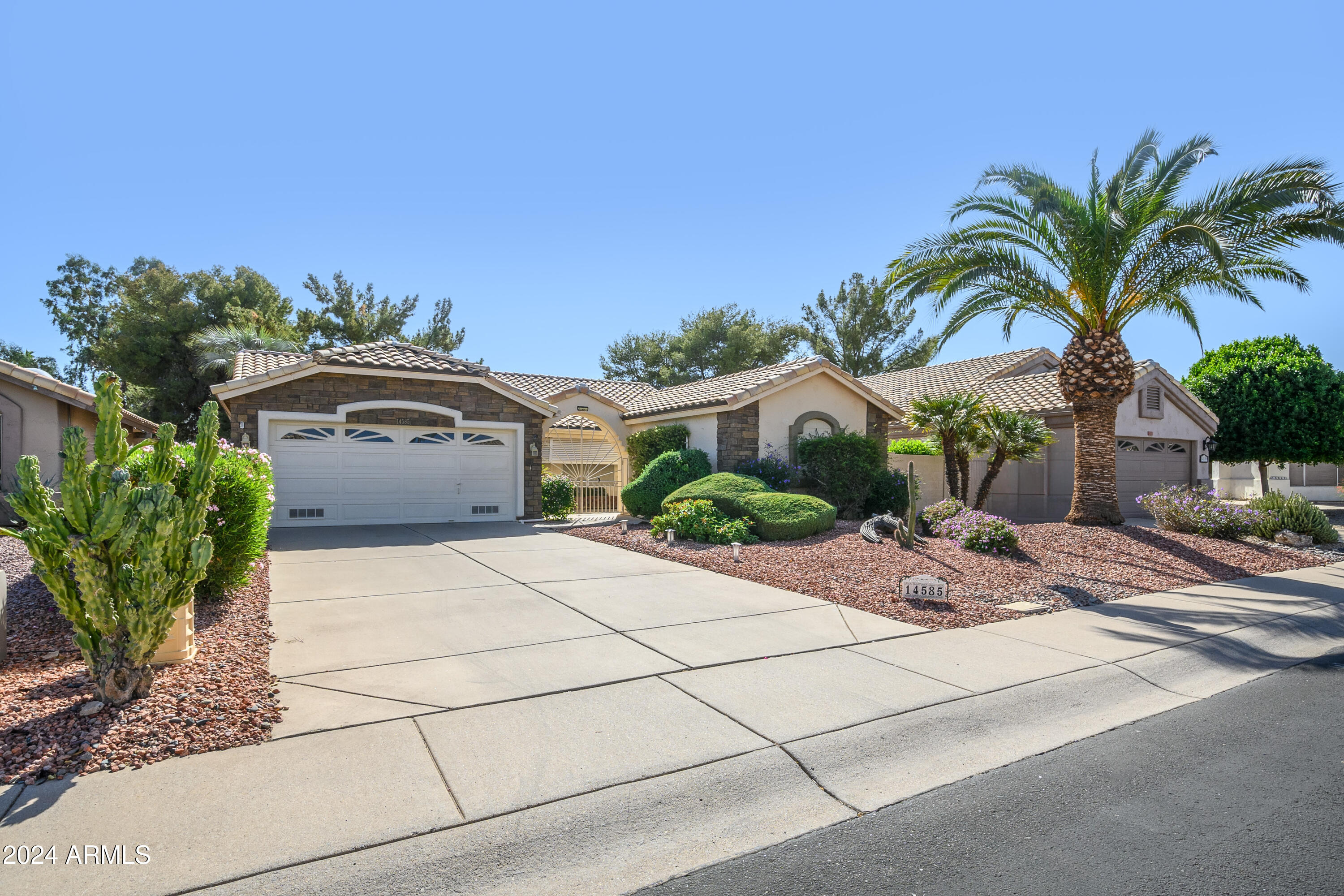 14585 West Raindance Road Surprise, AZ 85374 - Photo 2 of 41 Garage Front