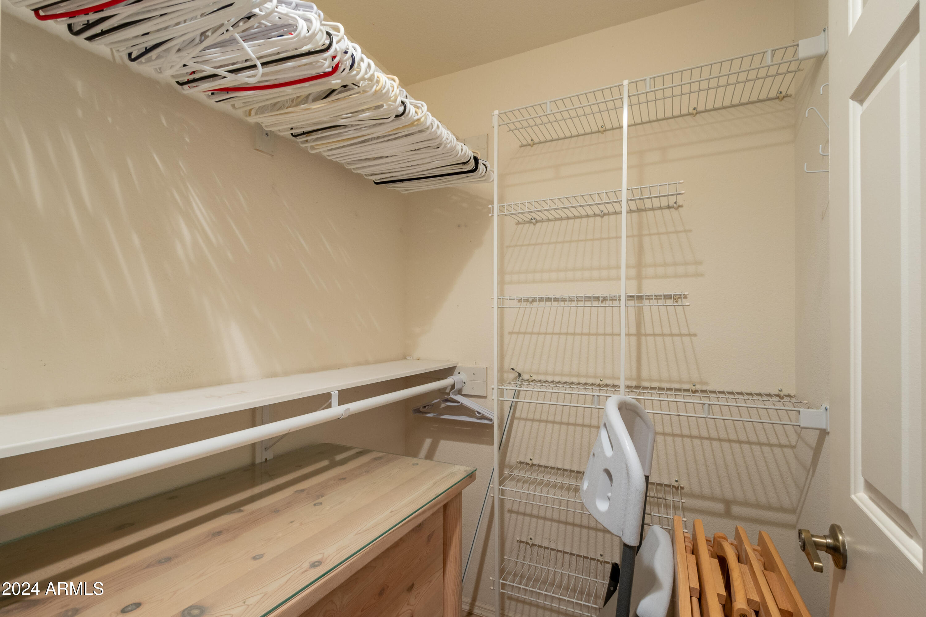 14585 West Raindance Road Surprise, AZ 85374 - Photo 35 of 41 Guest Bedroom Walk In Closet