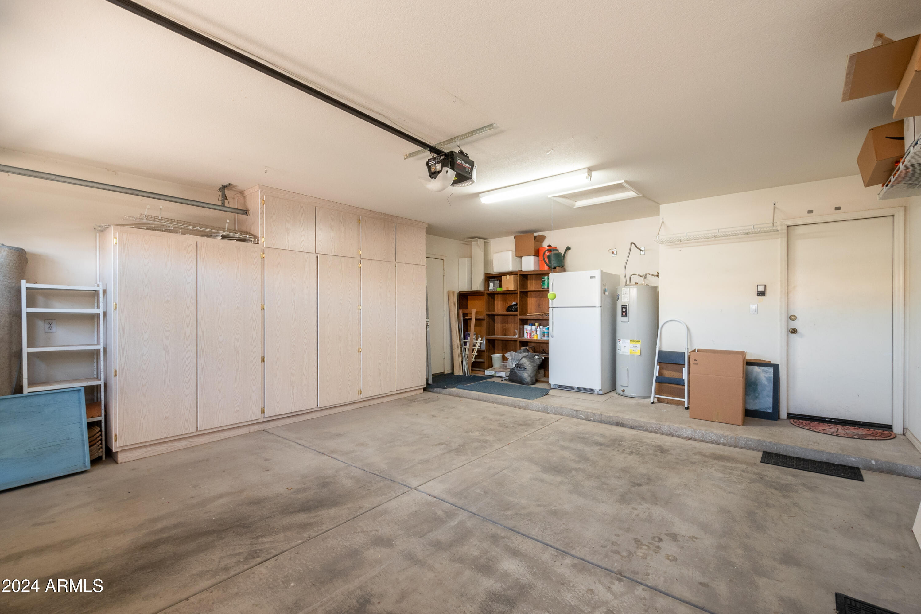 14585 West Raindance Road Surprise, AZ 85374 - Photo 41 of 41 Garage W/Side Door