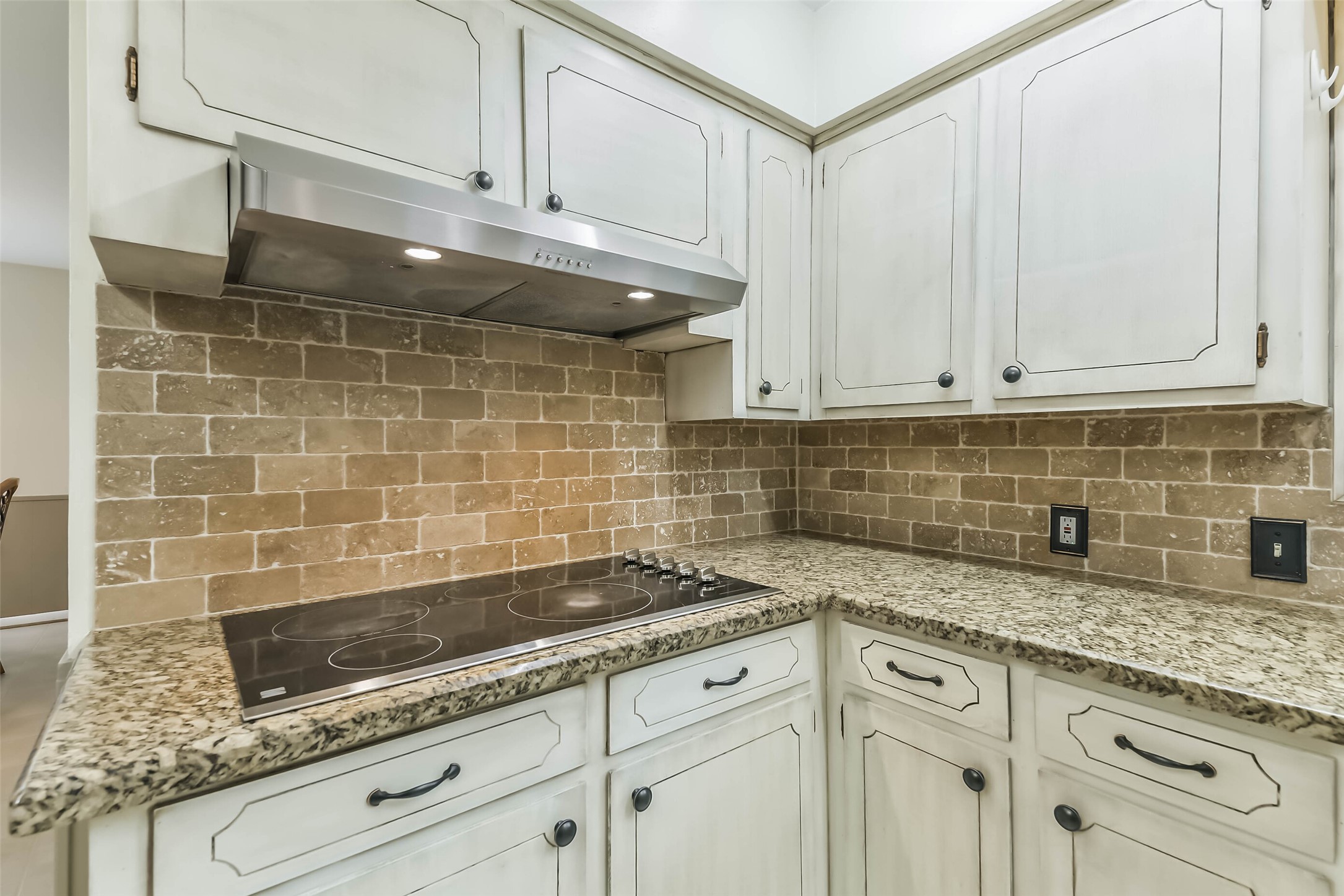 1210 Timber Lane Rosenberg, TX 77471 - Photo 12 of 48 a sink with granite countertop white cabinets