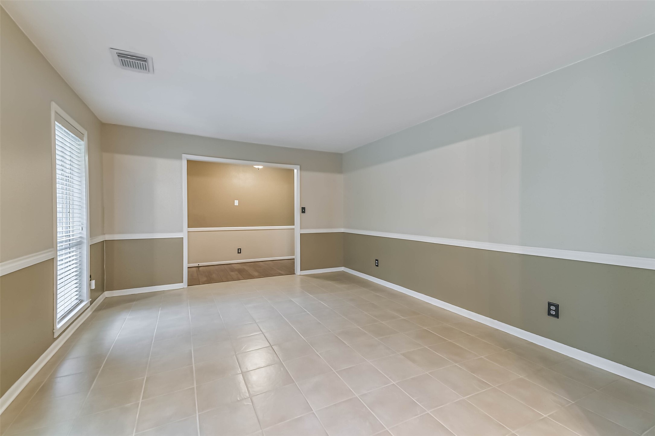 1210 Timber Lane Rosenberg, TX 77471 - Photo 18 of 48 an empty room with windows